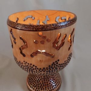 Carved-Pyro-Candleholder-Bowl with cutout designs to allow candle light out